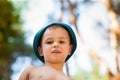 Outdoor close up portrait of little boy in a hat . Background, one person, child, 4-5 years old, happy smilling.