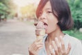 Outdoor closeup portrait of children eating ice cream