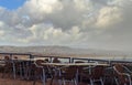 Outdoor coffee in the rain with a view of the ocean and sky