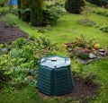 Outdoor composting bin for recycling kitchen and garden organic waste Royalty Free Stock Photo