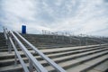 Outdoor concrete staircase with stainless steel handrail Royalty Free Stock Photo