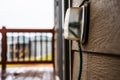 Outdoor covered GCFI outlet with power cord in use Royalty Free Stock Photo