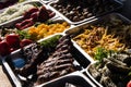 Outdoor Cuisine Culinary Buffet with healthy take away meal - grilled vegetables, fish and meat on the street food culinary market Royalty Free Stock Photo