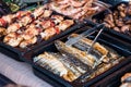 Outdoor Cuisine Culinary Buffet with healthy take away meal - grilled vegetables, fish and meat on the street food culinary market Royalty Free Stock Photo