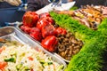 Outdoor Cuisine Culinary Buffet with healthy take away meal - grilled vegetables, salads, meat on the street food culinary market,