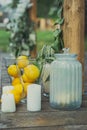 Outdoor decor elements bank, lemons and candles