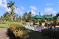 Outdoor eating area at a restaurant in a tropical location Royalty Free Stock Photo