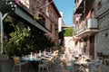 Outdoor eating of a restaurant or cafe in Taormina, Sicily. Table setting for dining Royalty Free Stock Photo