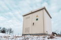 Outdoor electric high voltage distribution cabinet in a snow