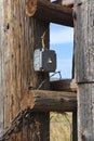 Outdoor electrical switch located on a corral post Royalty Free Stock Photo