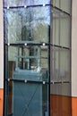 an outdoor elevator with a glass structure can be added to a