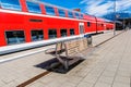 Outdoor empty passenger seat at train station in Fussen Germany Royalty Free Stock Photo