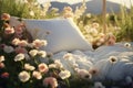 Outdoor escape bed in nature, relaxation with flowers, pillow coverlet