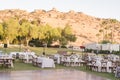 outdoor event, white chairs and tables placed outside Royalty Free Stock Photo