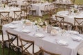 outdoor event, white chairs and tables placed outside Royalty Free Stock Photo