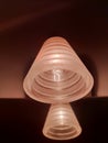 Outdoor exterior small round lamp on wooden wall. External illumination