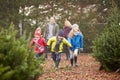 Outdoor Family Choosing Christmas Tree Together Royalty Free Stock Photo