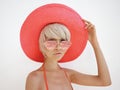 Beautiful lady in red hat and sunglasses Royalty Free Stock Photo