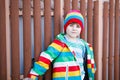 Outdoor fashion portrait of adorable little kid boy wearing colorful clothes Royalty Free Stock Photo