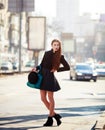 Outdoor fashion portrait of glamour sensual young stylish lady wearing trendy fall outfit , black hat Royalty Free Stock Photo