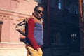 Outdoor fashion portrait of handsome stylish african man