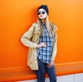 Outdoor fashion portrait of stylish hipster cool girl