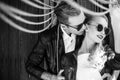 Outdoor fashion portrait of young beautiful couple. Valentine's Day. Love. Wedding. Black and white