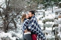 Outdoor fashion portrait of young sensual couple in cold winter weather. love and kiss Royalty Free Stock Photo