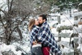 Outdoor fashion portrait of young sensual couple in cold winter weather. love and kiss Royalty Free Stock Photo