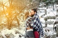 Outdoor fashion portrait of young sensual couple in cold winter weather. love and kiss Royalty Free Stock Photo