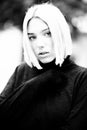 Outdoor female portrait, soft focus, black and white. Fashion model. Portrait of young woman. Royalty Free Stock Photo