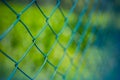 Green iron fence abstract scene on blurred nature background Royalty Free Stock Photo