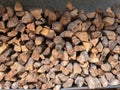 Outdoor firewood pile in overcast outdoor building Royalty Free Stock Photo