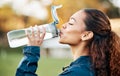 Outdoor, fitness and woman drinking water, wellness and workout with hydration, exercise and sports. Person, healthy