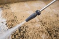 Outdoor floor cleaning with high pressure water jet