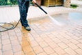 Outdoor floor cleaning with high pressure water jet - cleaning c Royalty Free Stock Photo