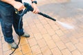 Outdoor floor cleaning with high pressure water jet - cleaning c Royalty Free Stock Photo