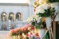 Outdoor flower market with roses, peonies and lilies. Fresh flowers street shop in historic downtown. Milan Royalty Free Stock Photo