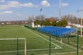 Outdoor football stadium, with small blue stands