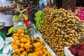 Outdoor fruit market with many different Asian organic fresh fruits. Royalty Free Stock Photo