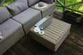 Outdoor furniture lounge group with chairs, sofa and table in a patio. Seating on the balcony, is a recreation place