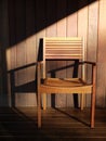 Outdoor furniture: teak wooden chair Royalty Free Stock Photo