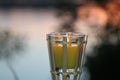 Outdoor glass votives lit in evening