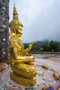 Outdoor Golden Buddha Image in beautiful Buddhist temple