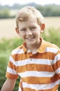 Outdoor Head And Shoulder Portrait Of Boy