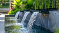 Outdoor home modern water feature fountain waterfall as wide banner Royalty Free Stock Photo