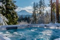 Outdoor Hot Tub Overlooking a Majestic Mountain Range Royalty Free Stock Photo