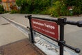 a gate and sign with words on it that says stadten trample