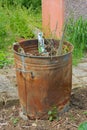 Outdoor incinerator full of garden rubbish Royalty Free Stock Photo