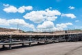 Outdoor incline large conveyor with rubber belt conveyor for transportation line for processing the coal in the coal mine. Royalty Free Stock Photo